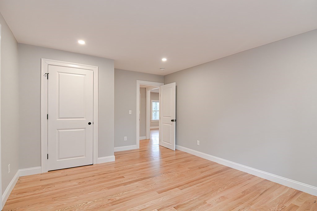 108 Olive Street Ashland, MA 01721 - Photo 13 of 34 a view of empty room with wooden floor