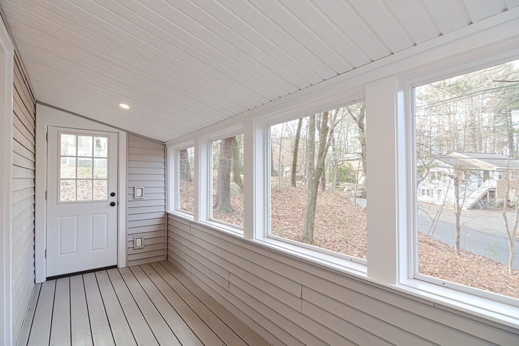 108 Olive Street Ashland, MA 01721 - Photo 14 of 34 a view of empty room with wooden floor and fan