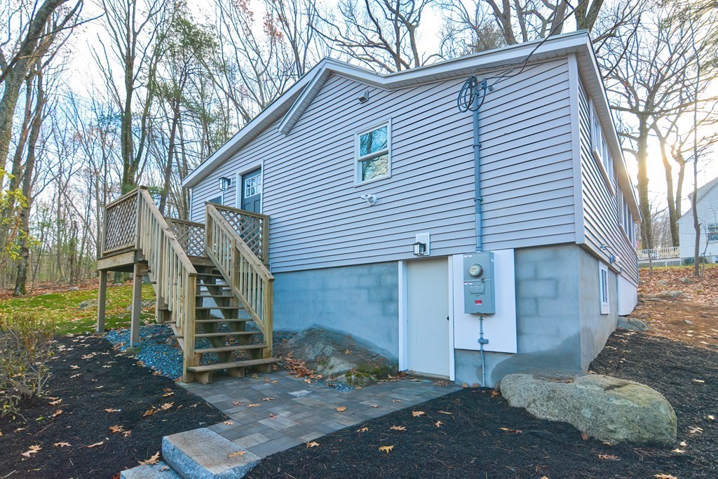 108 Olive Street Ashland, MA 01721 - Photo 29 of 34 a view of a house with a yard