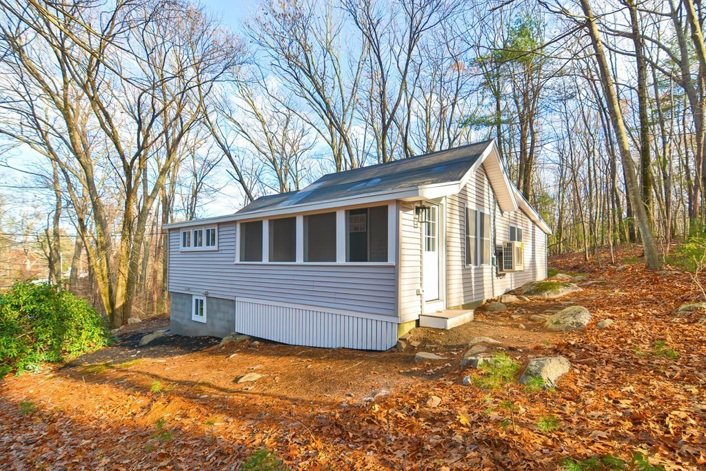 108 Olive Street Ashland, MA 01721 - Photo 31 of 34 a view of a house with a yard