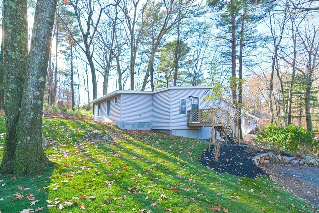 108 Olive Street Ashland, MA 01721 - Photo 34 of 34 a backyard of a house with lots of green space