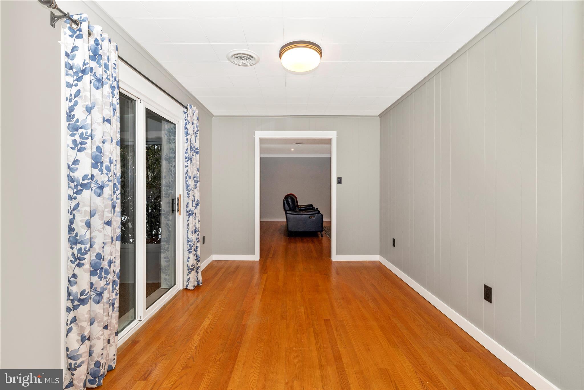 215 Broad Street Middletown, MD 21769 - Photo 11 of 56 a view of a room with wooden floor and furniture