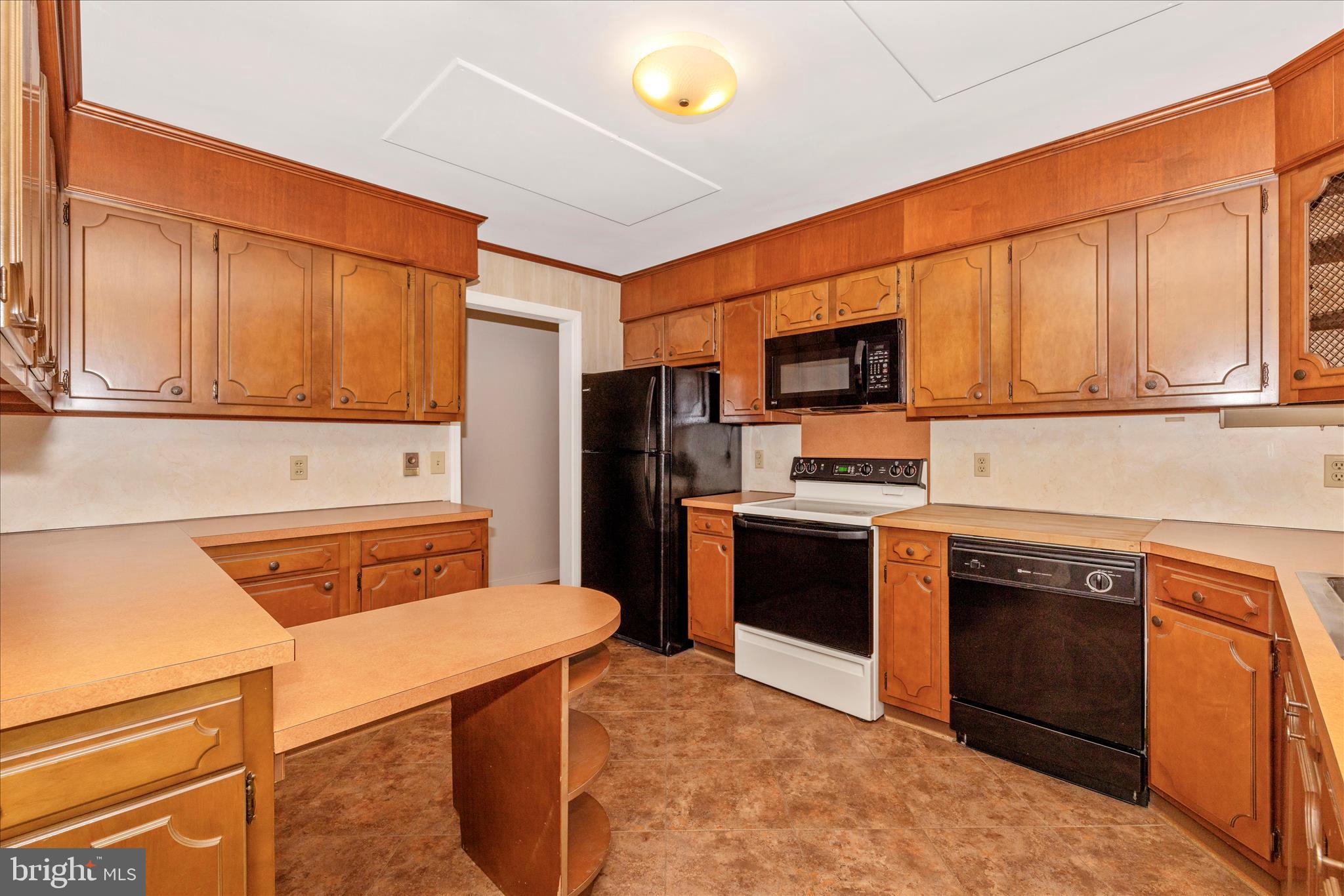 215 Broad Street Middletown, MD 21769 - Photo 12 of 56 a kitchen with stainless steel appliances granite countertop a stove refrigerator sink and microwave
