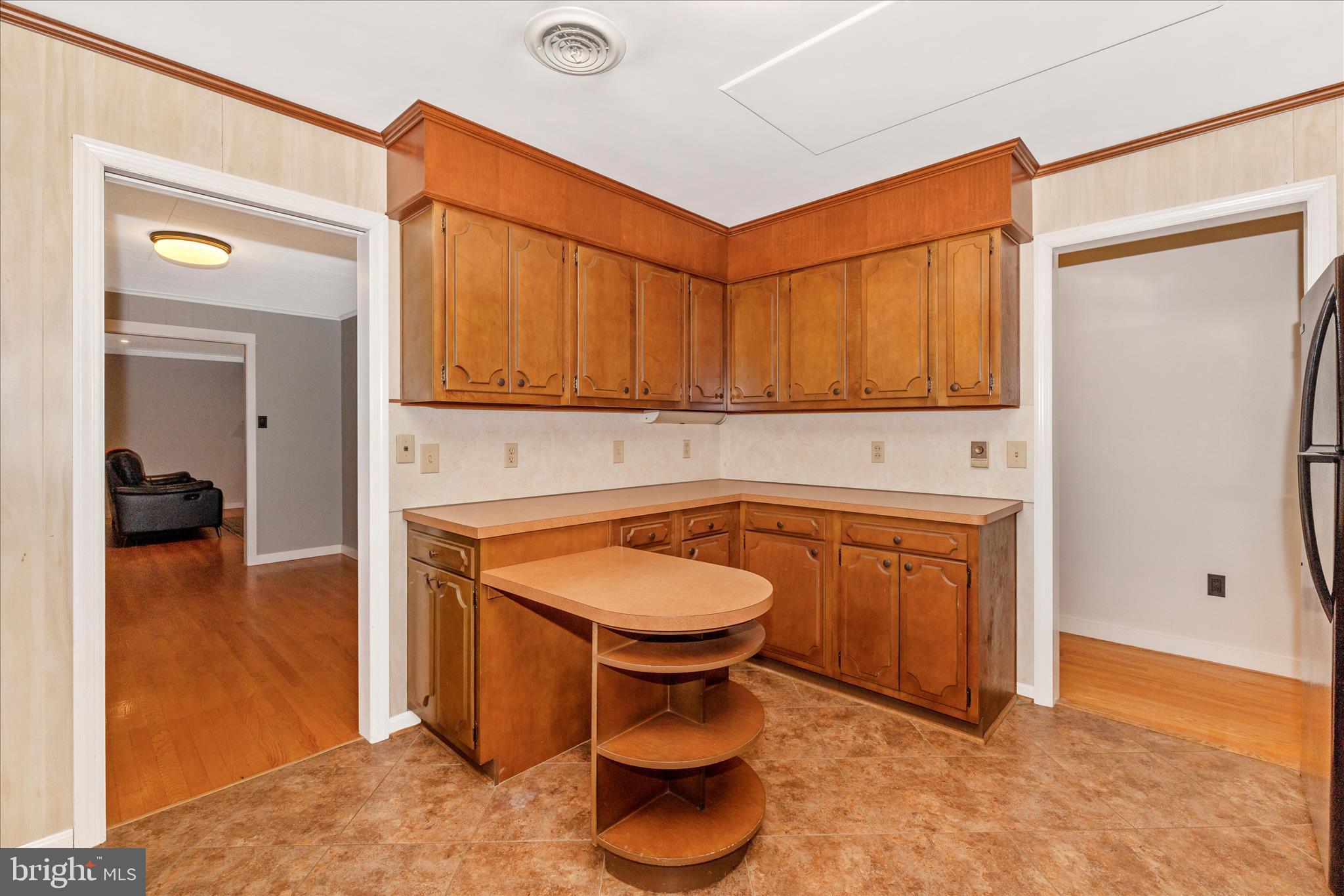 215 Broad Street Middletown, MD 21769 - Photo 13 of 56 a bathroom with a toilet a sink and a mirror