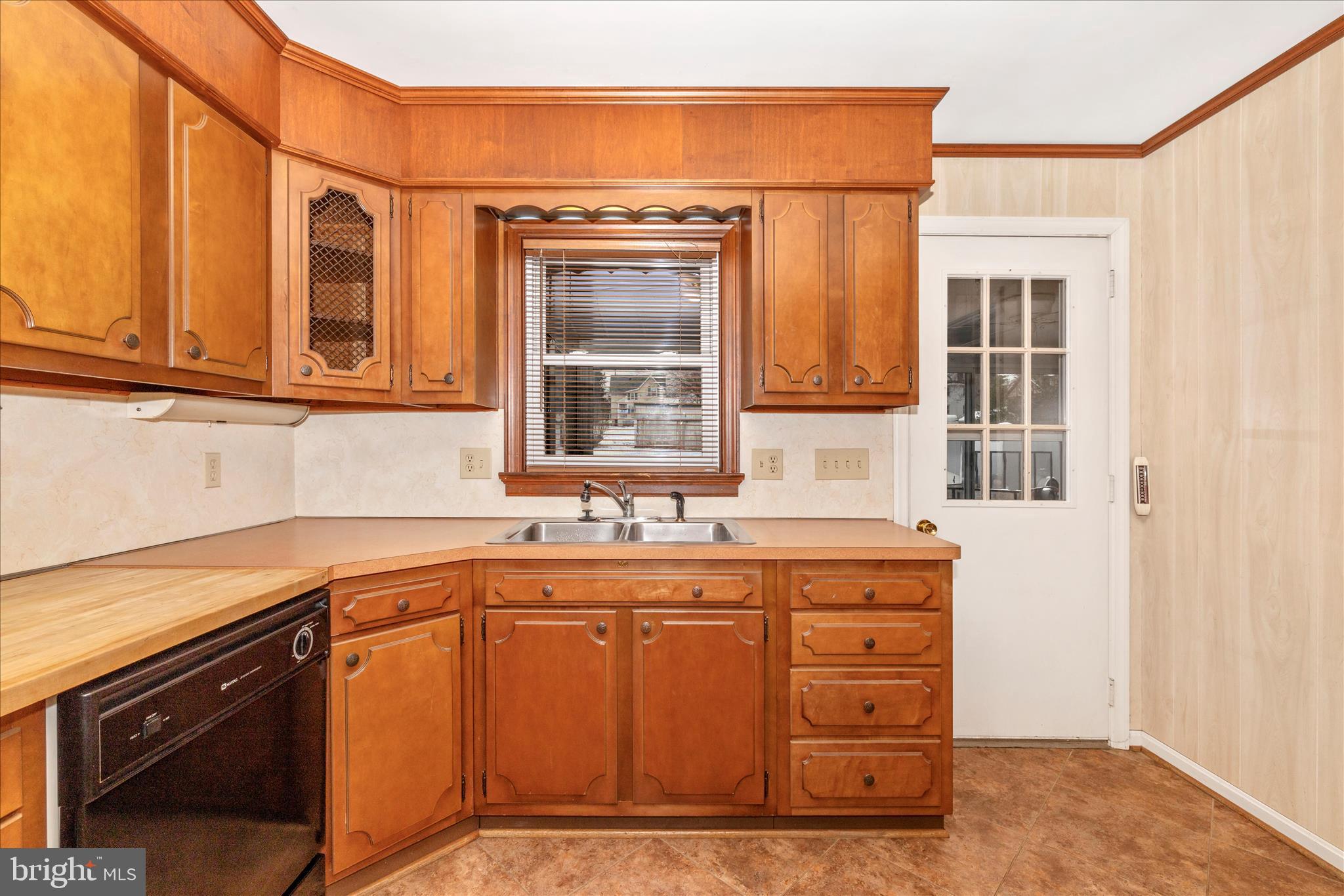 215 Broad Street Middletown, MD 21769 - Photo 16 of 56 a kitchen with a sink stove and cabinets