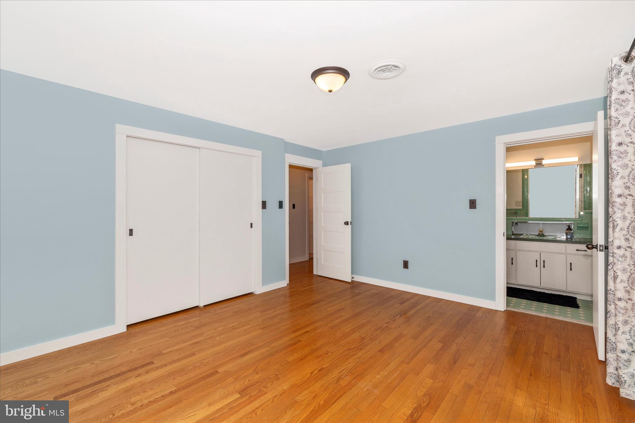 215 Broad Street Middletown, MD 21769 - Photo 20 of 56 a view of a livingroom with wooden floor
