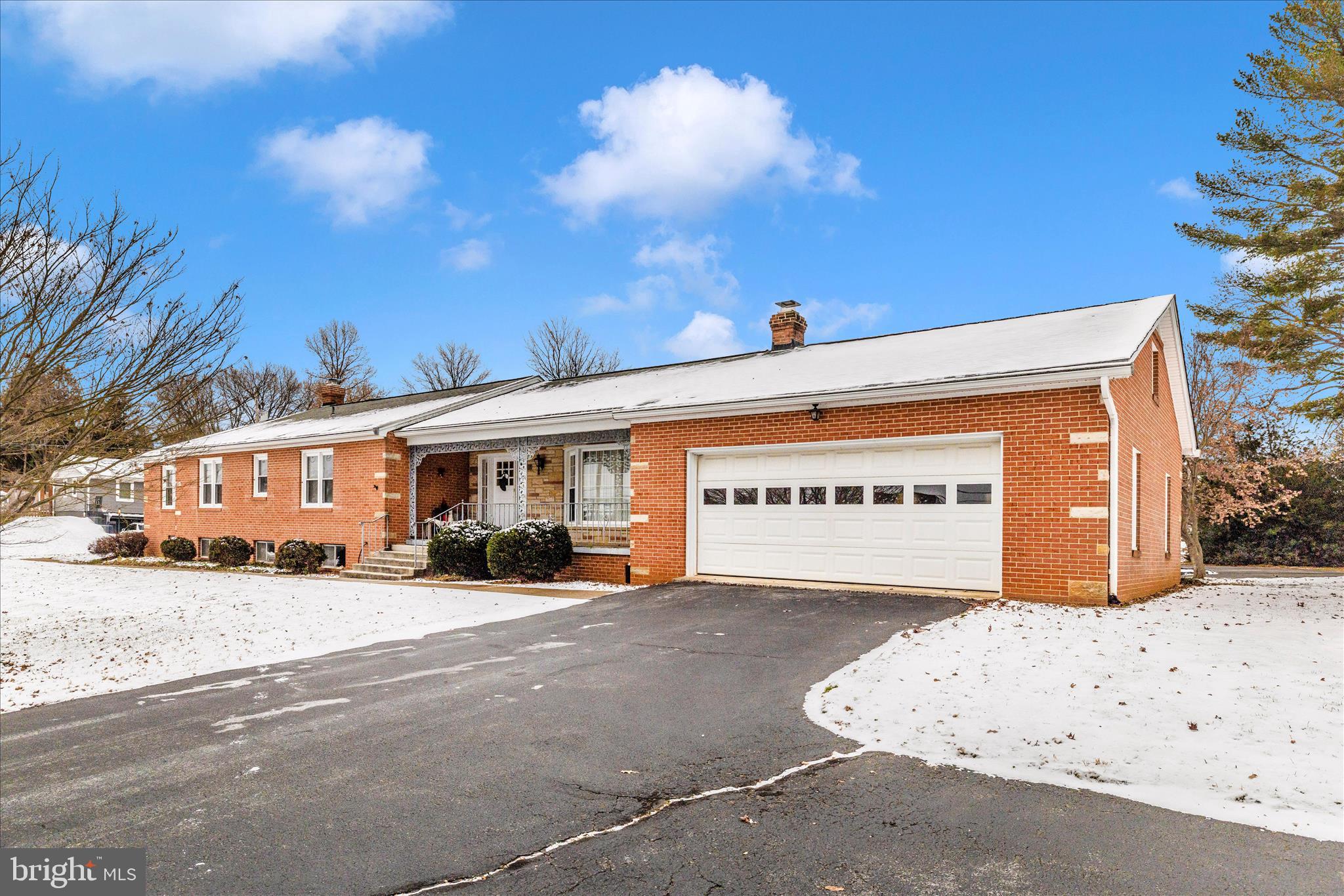 215 Broad Street Middletown, MD 21769 - Photo 2 of 56 a view of a street sign