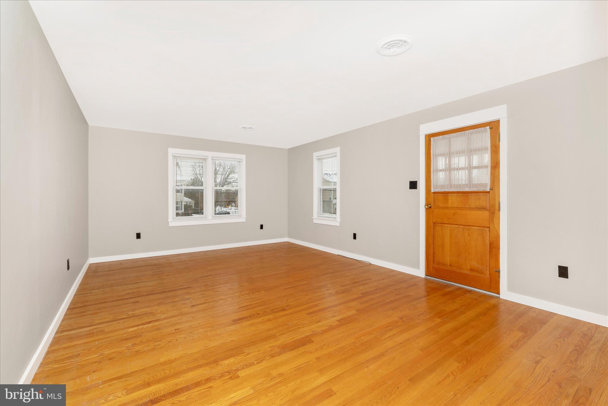215 Broad Street Middletown, MD 21769 - Photo 29 of 56 wooden floor in an empty room with a window