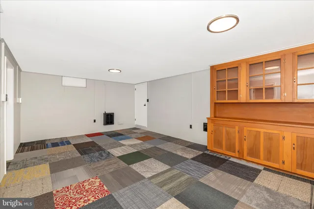a view of a house with a snow in front of it