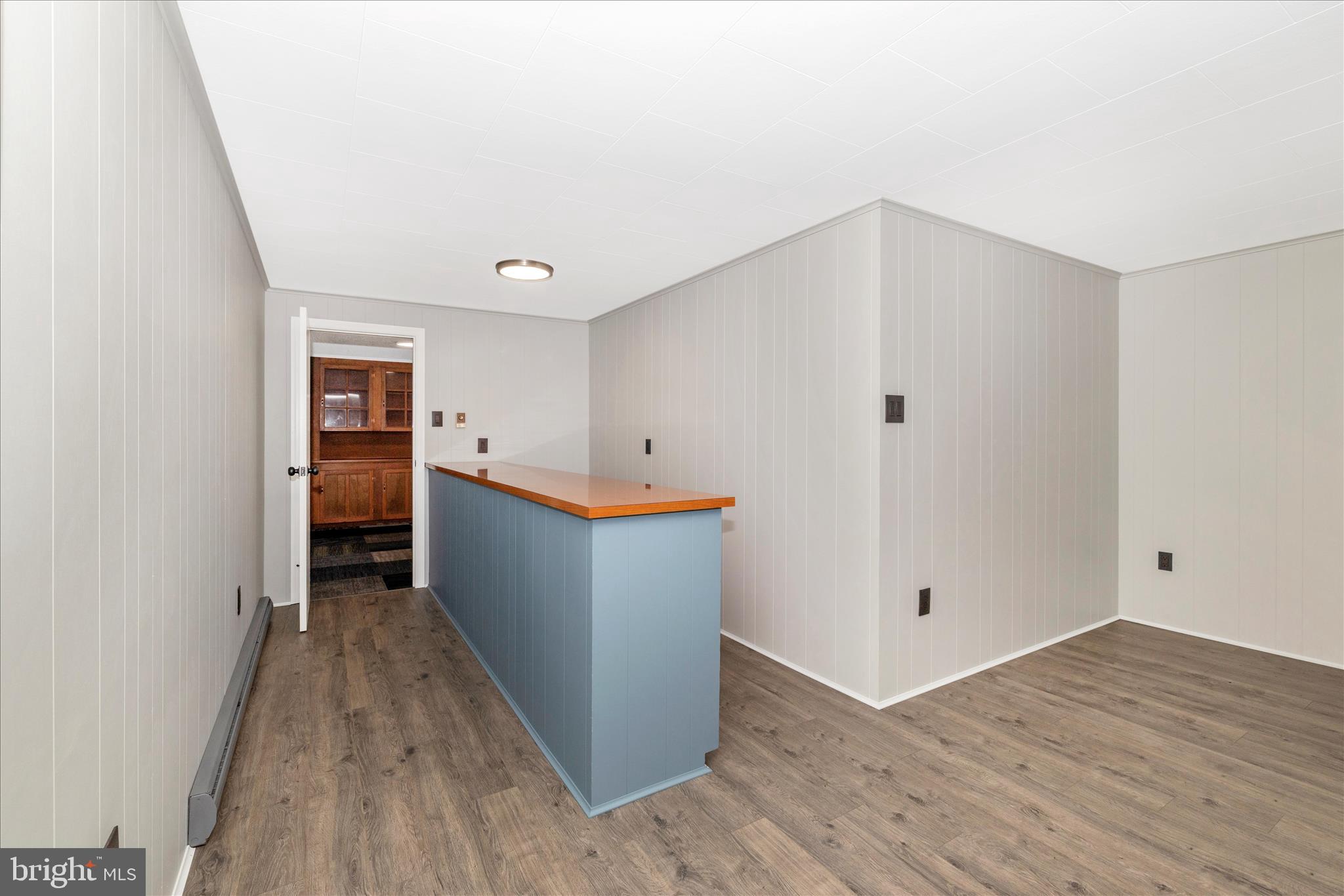 215 Broad Street Middletown, MD 21769 - Photo 36 of 56 a view of a kitchen with wooden floor
