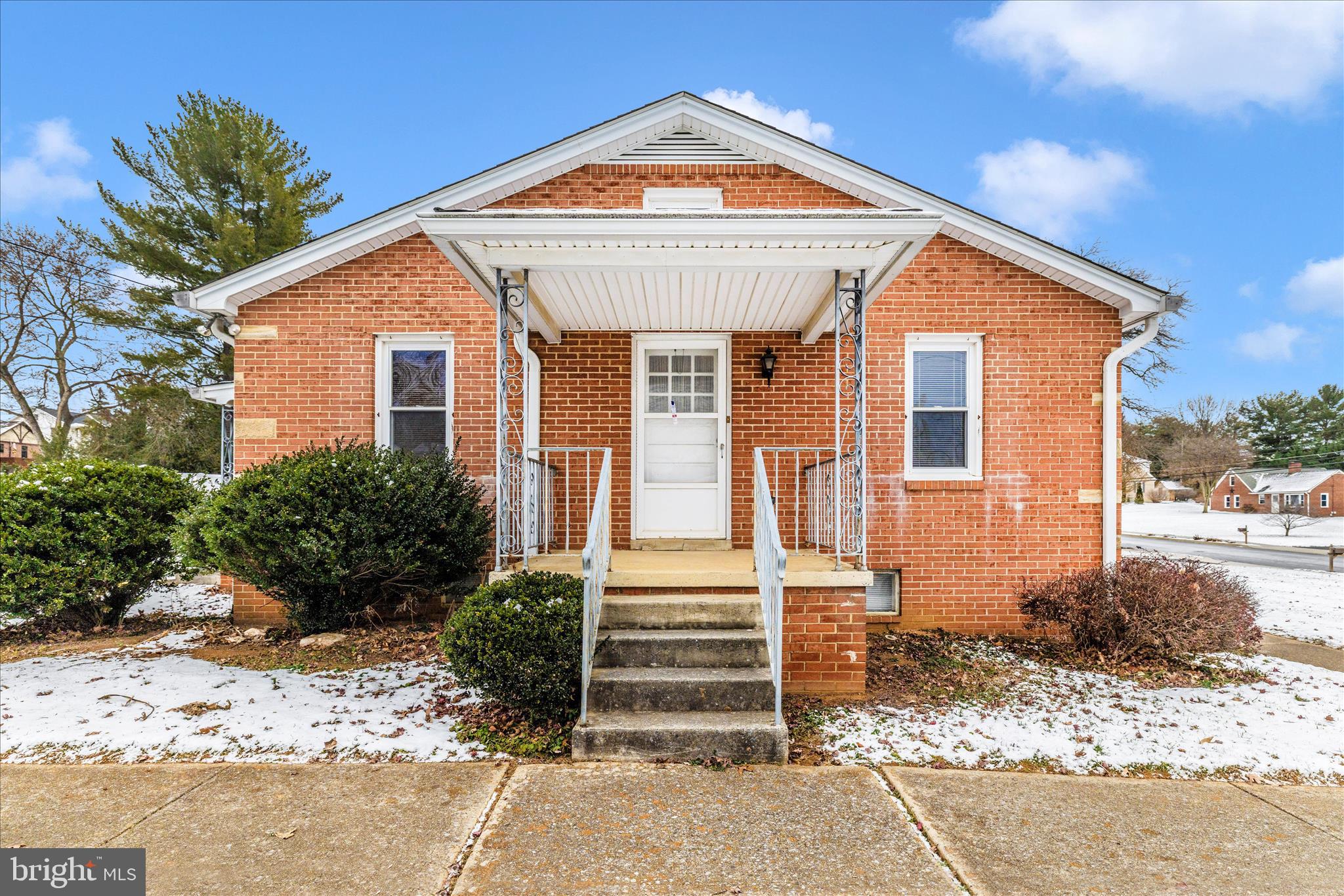 215 Broad Street Middletown, MD 21769 - Photo 49 of 56 a front view of a house with a yard