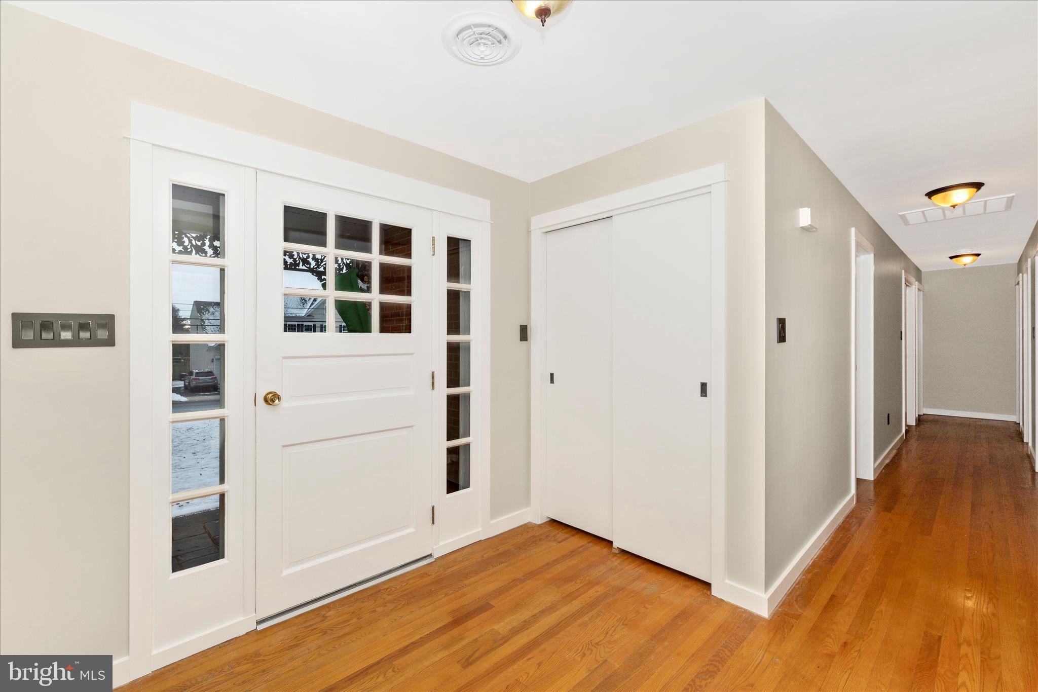 215 Broad Street Middletown, MD 21769 - Photo 5 of 56 a view of a bedroom with wooden floor and cabinet