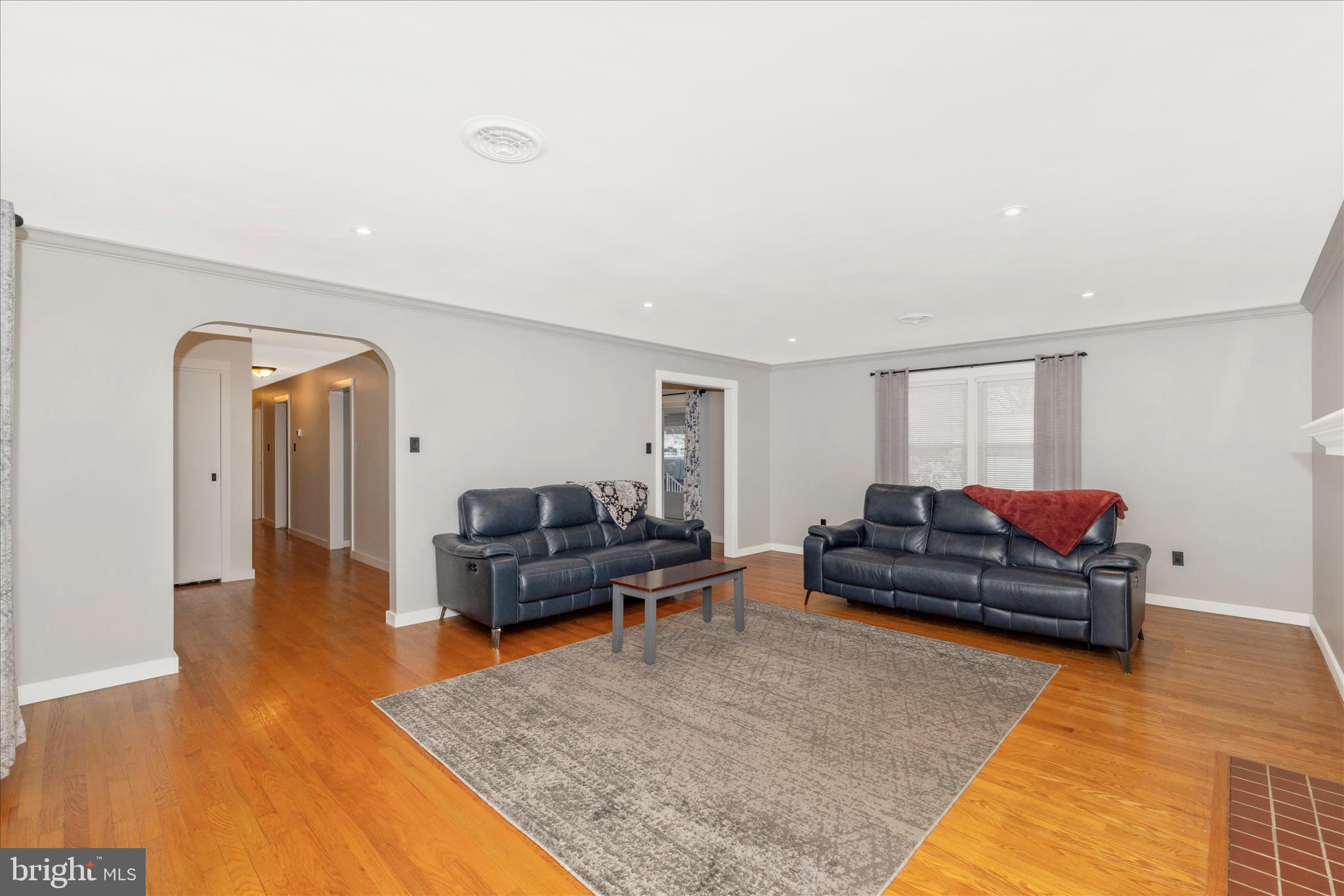 215 Broad Street Middletown, MD 21769 - Photo 7 of 56 a living room with furniture and wooden floor