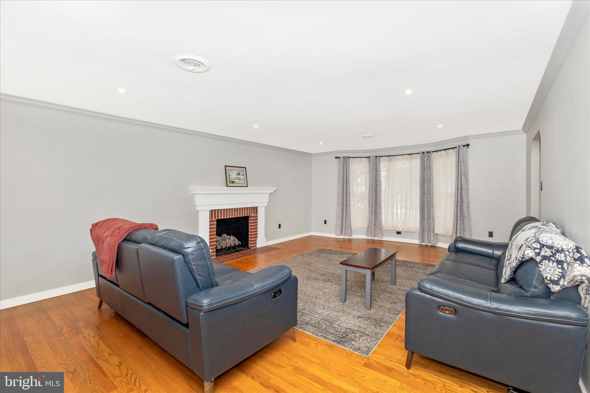 215 Broad Street Middletown, MD 21769 - Photo 8 of 56 a living room with furniture fireplace and flat screen tv