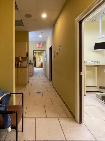 a view of a entryway door with living room