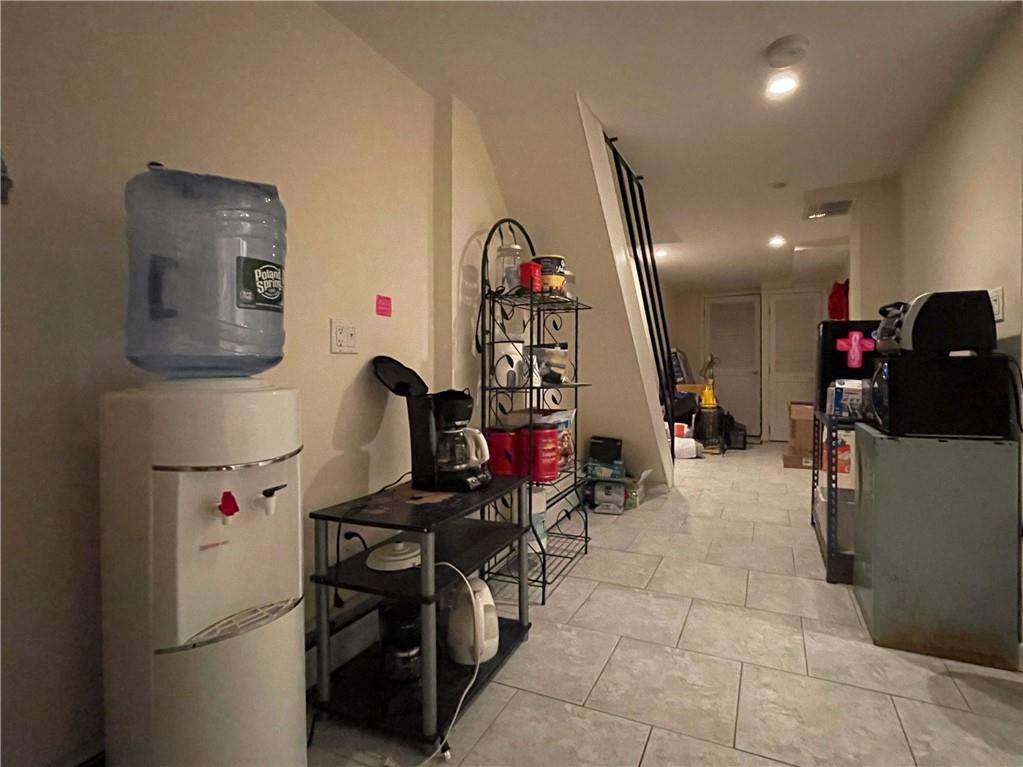 655 76th Street Brooklyn, NY 11209 - Photo 16 of 30 a view of a room with gym equipment