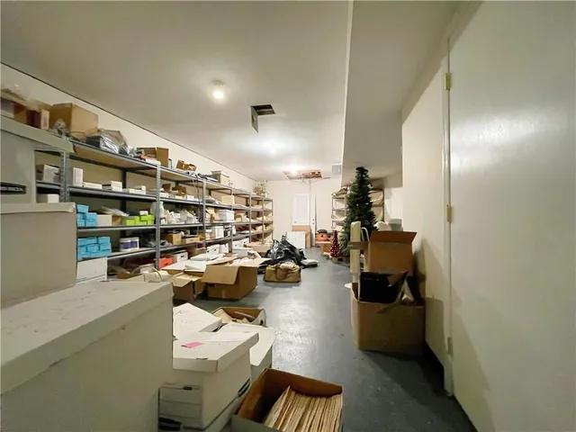 a view of a room with gaming equipment