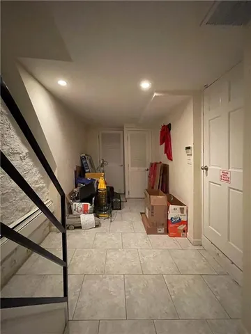 a room with furniture and a workspace