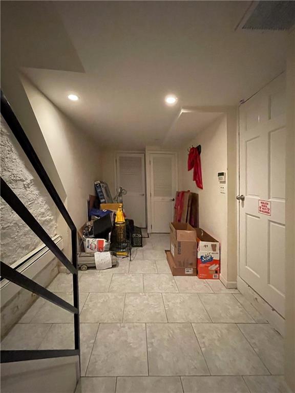 655 76th Street Brooklyn, NY 11209 - Photo 18 of 30 a view of a room with gaming equipment