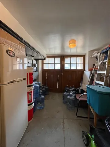 a kitchen with a stove top oven cabinets and stainless steel appliances