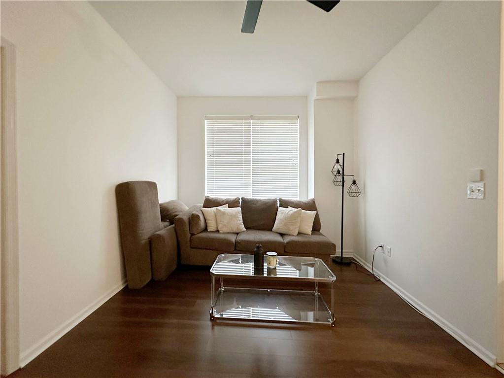 655 76th Street Brooklyn, NY 11209 - Photo 22 of 30 a living room with furniture