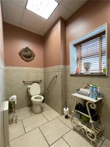 a bathroom with a sink and a toilet