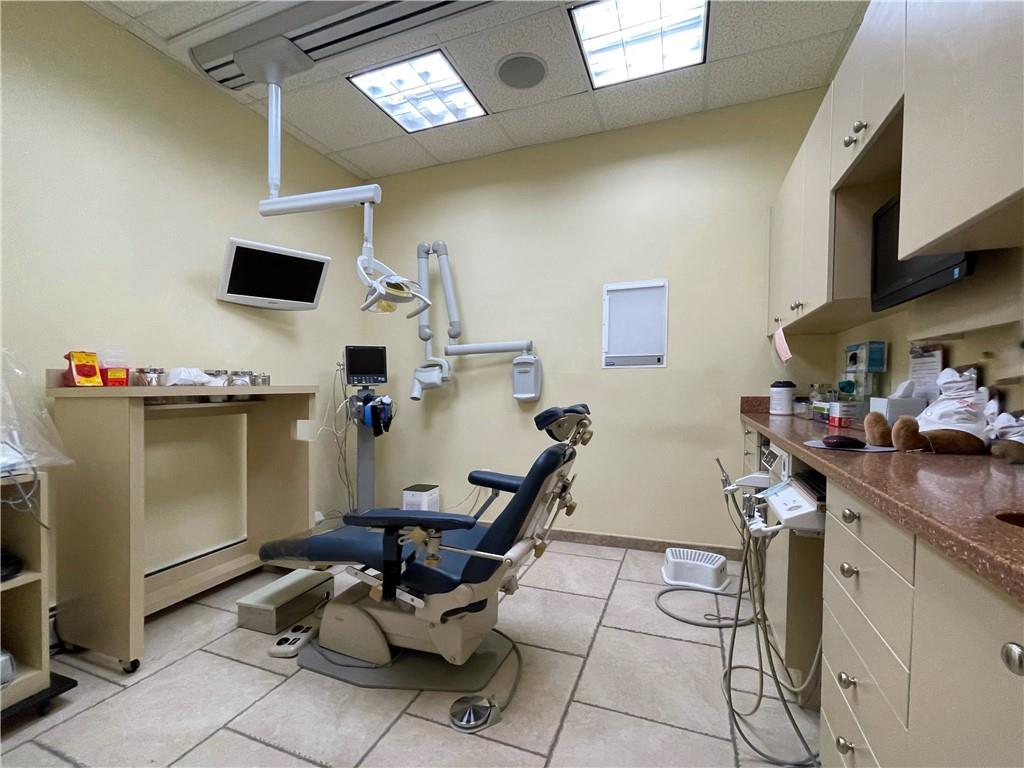 655 76th Street Brooklyn, NY 11209 - Photo 10 of 30 a room with furniture a air conditioner vent and a window