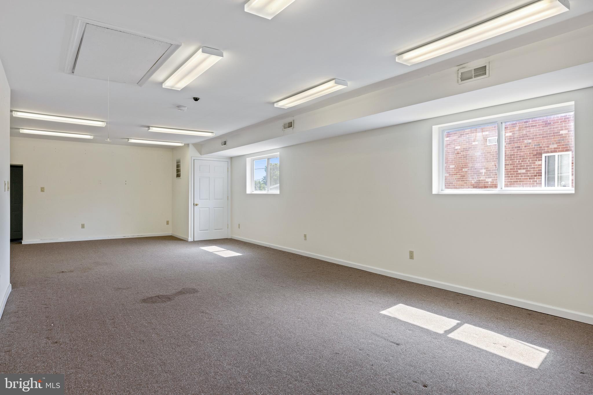 7026 Ridge Avenue Philadelphia, PA 19128 - Photo 15 of 24 a view of an empty room with a window