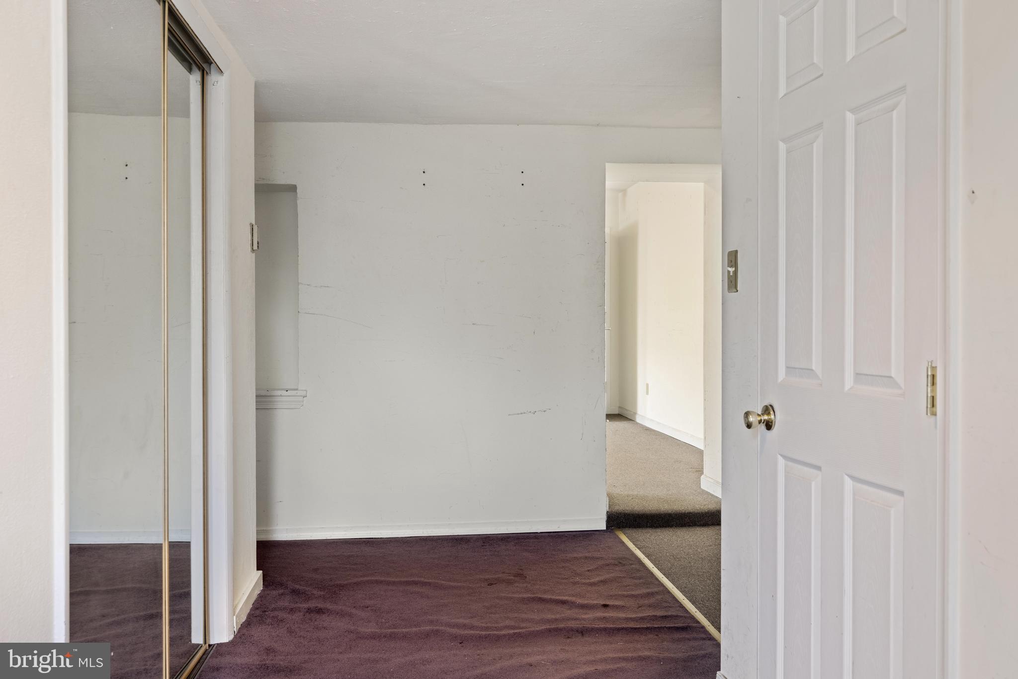 7026 Ridge Avenue Philadelphia, PA 19128 - Photo 17 of 24 a view of a hallway with wooden floor and closet