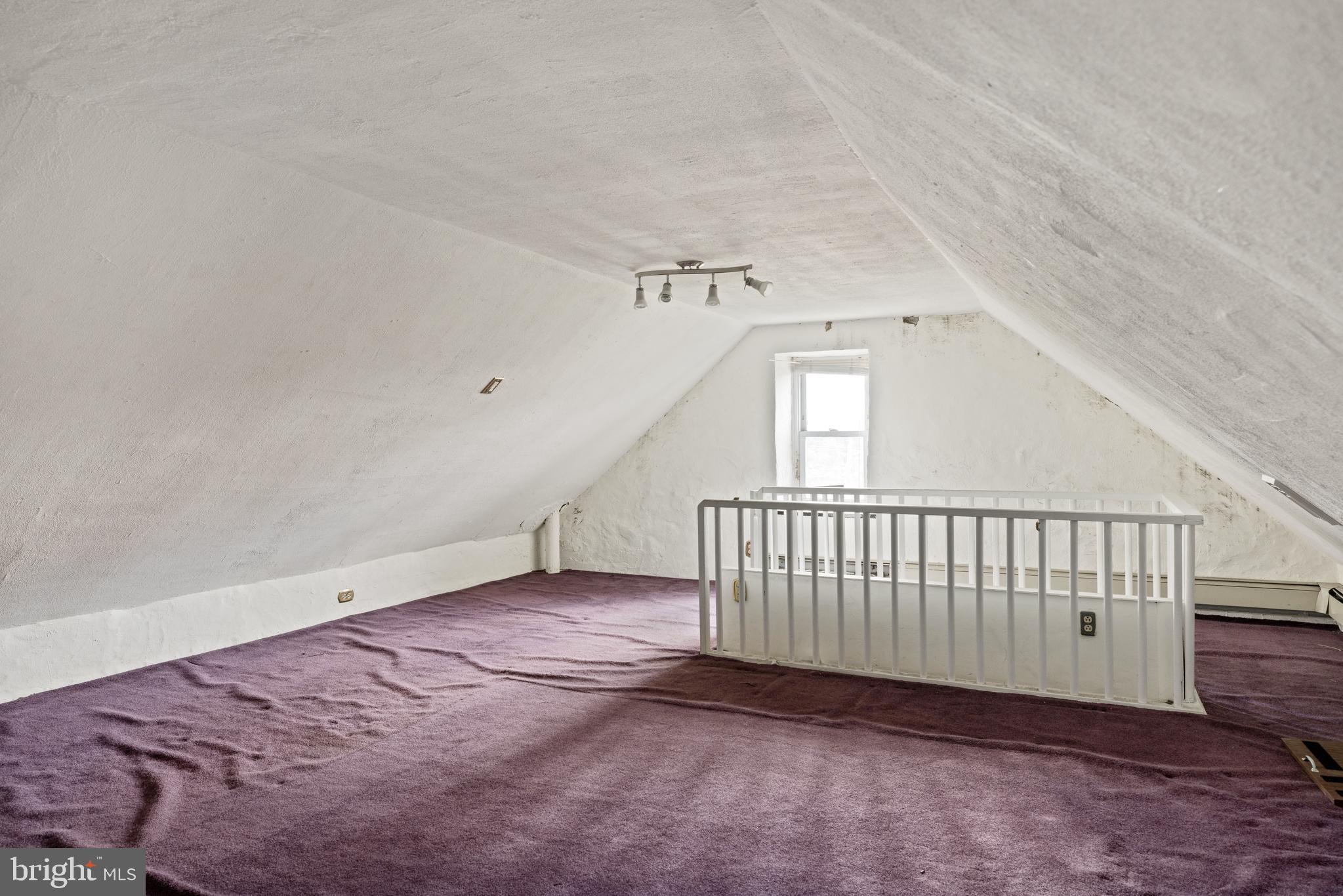 7026 Ridge Avenue Philadelphia, PA 19128 - Photo 20 of 24 a view of an empty room with a window