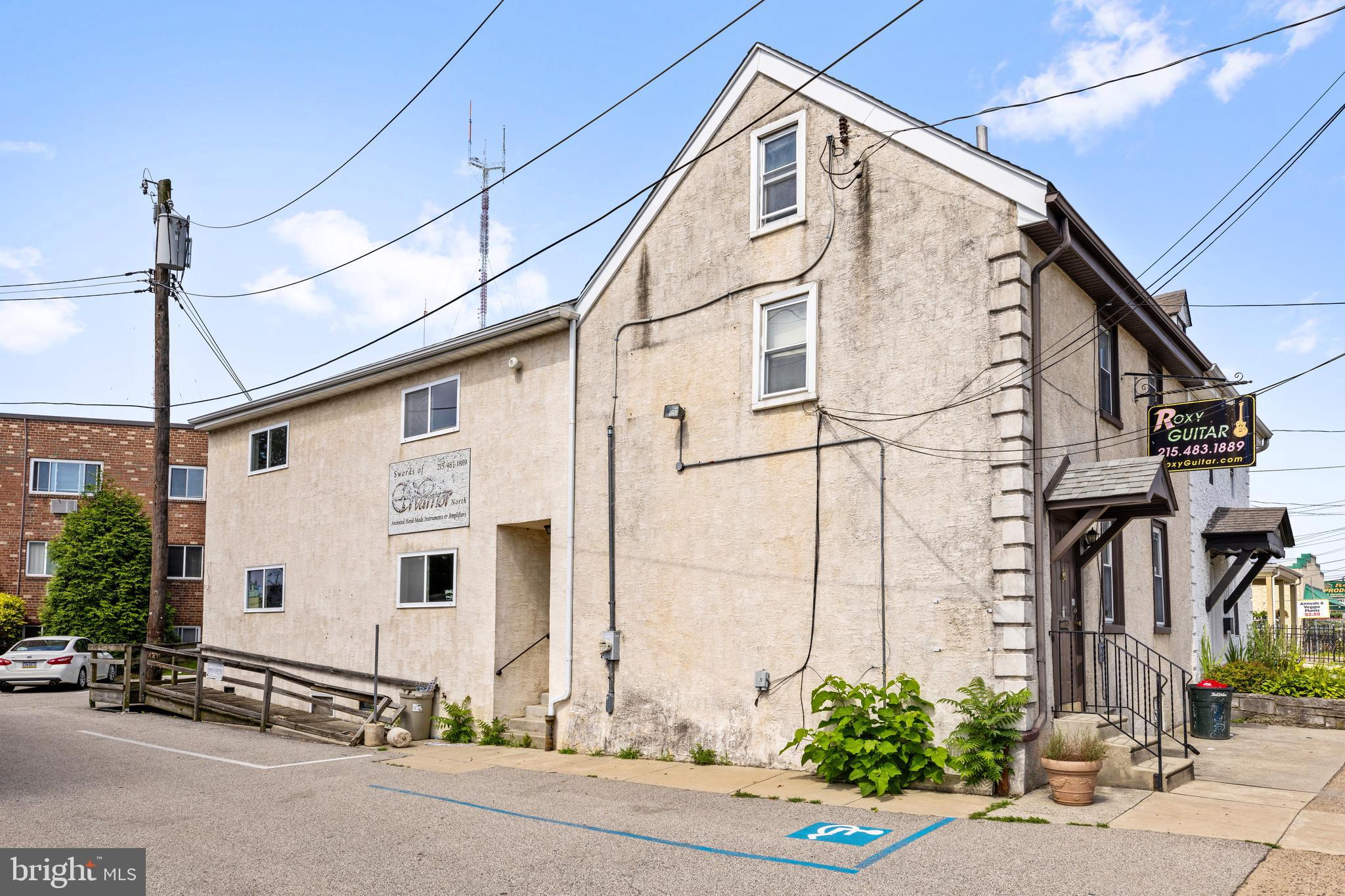 7026 Ridge Avenue Philadelphia, PA 19128 - Photo 2 of 24 a view of a white building