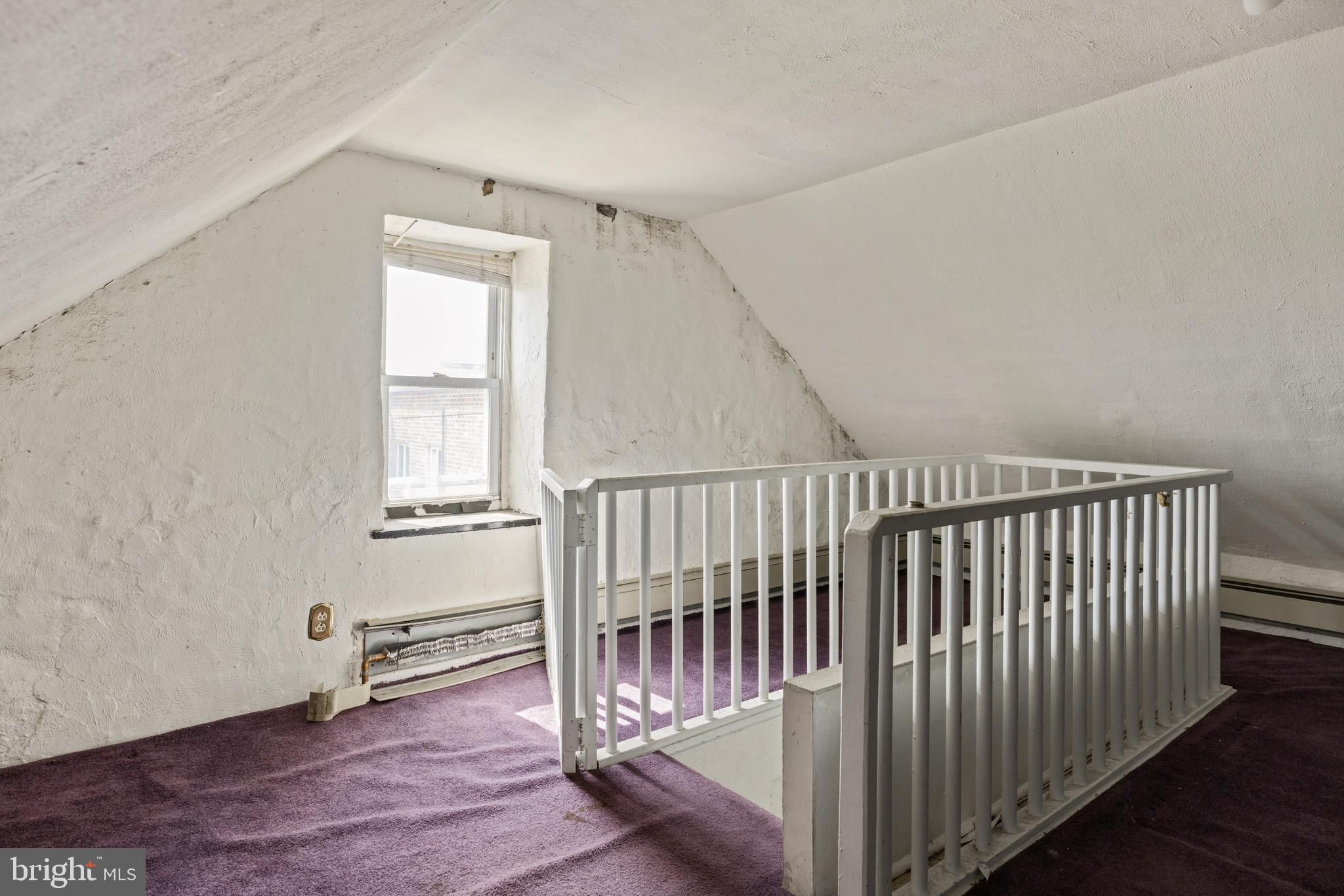 7026 Ridge Avenue Philadelphia, PA 19128 - Photo 22 of 24 an empty room with wooden floor and windows
