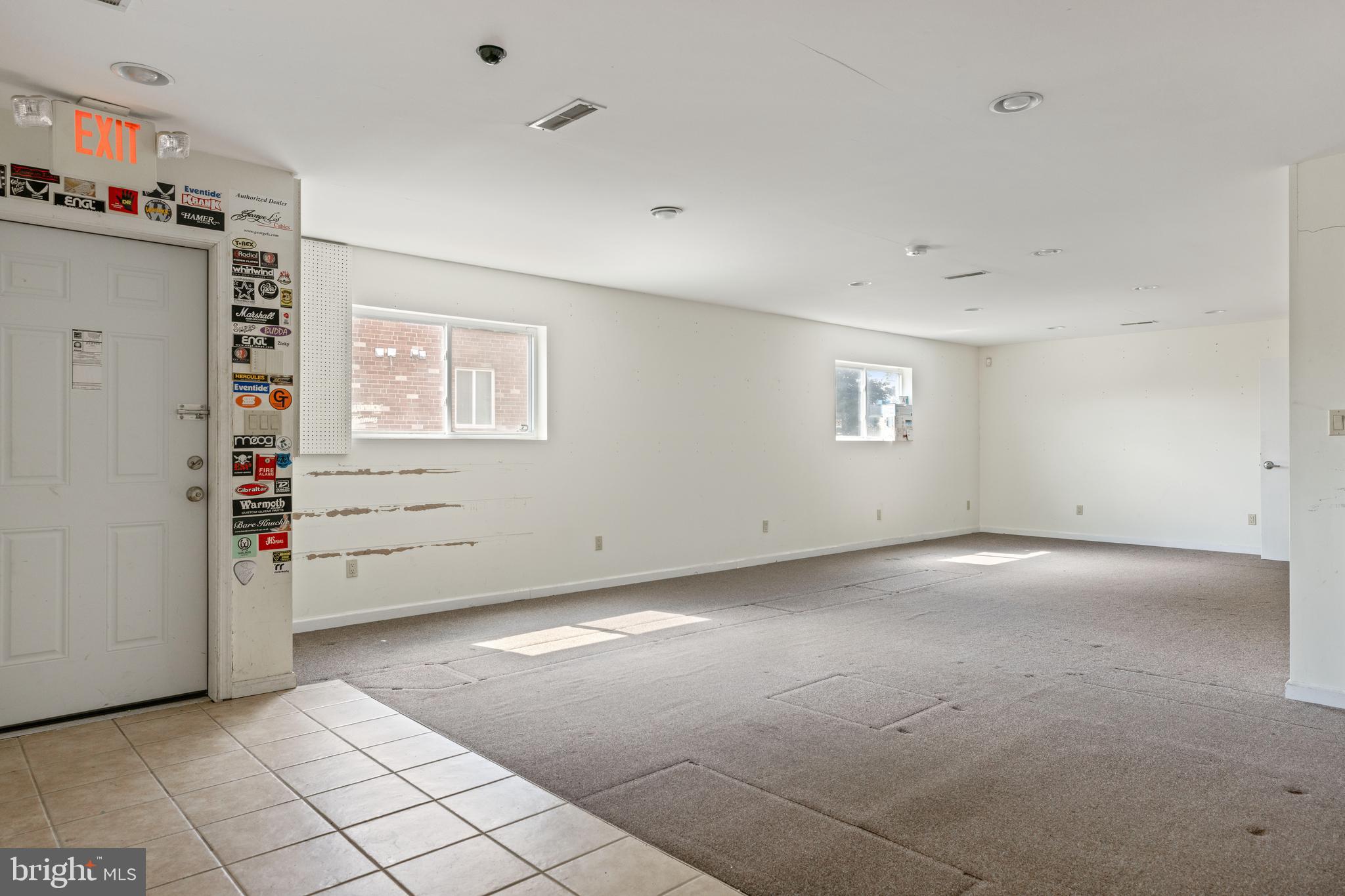 7026 Ridge Avenue Philadelphia, PA 19128 - Photo 7 of 24 a view of an empty room with closet and windows
