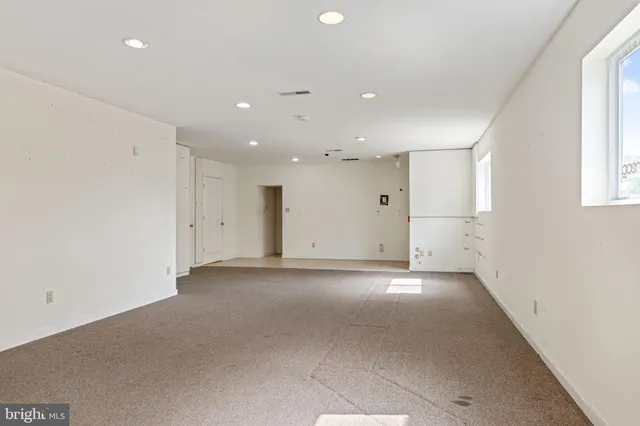 an empty room with window