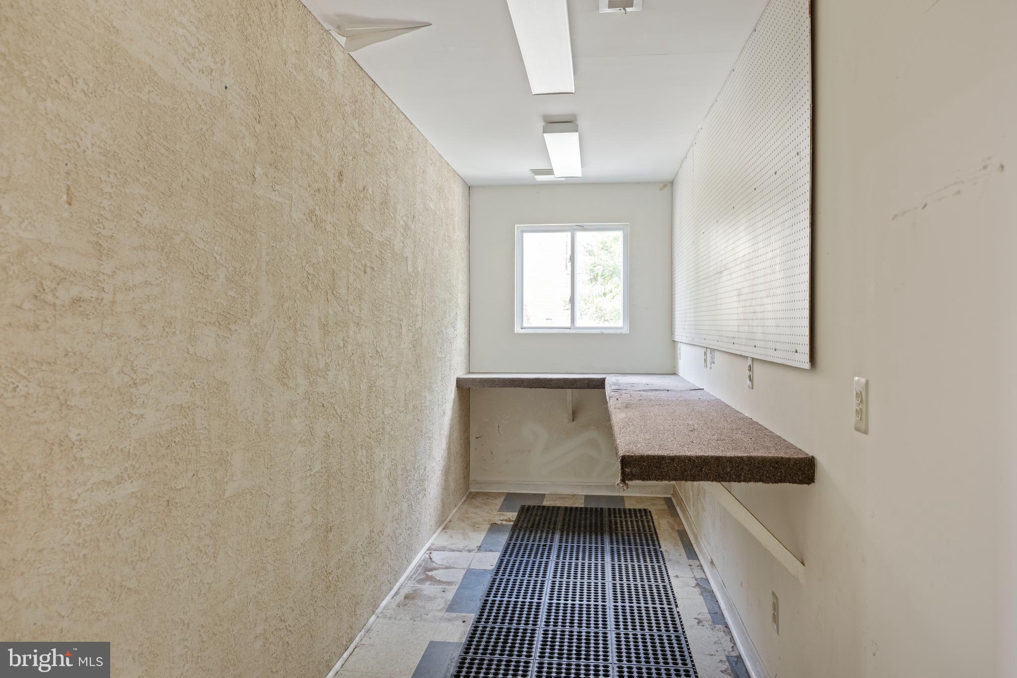 7026 Ridge Avenue Philadelphia, PA 19128 - Photo 10 of 24 an empty room with windows