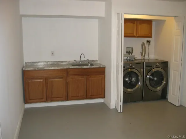 a view of entryway with wooden wall