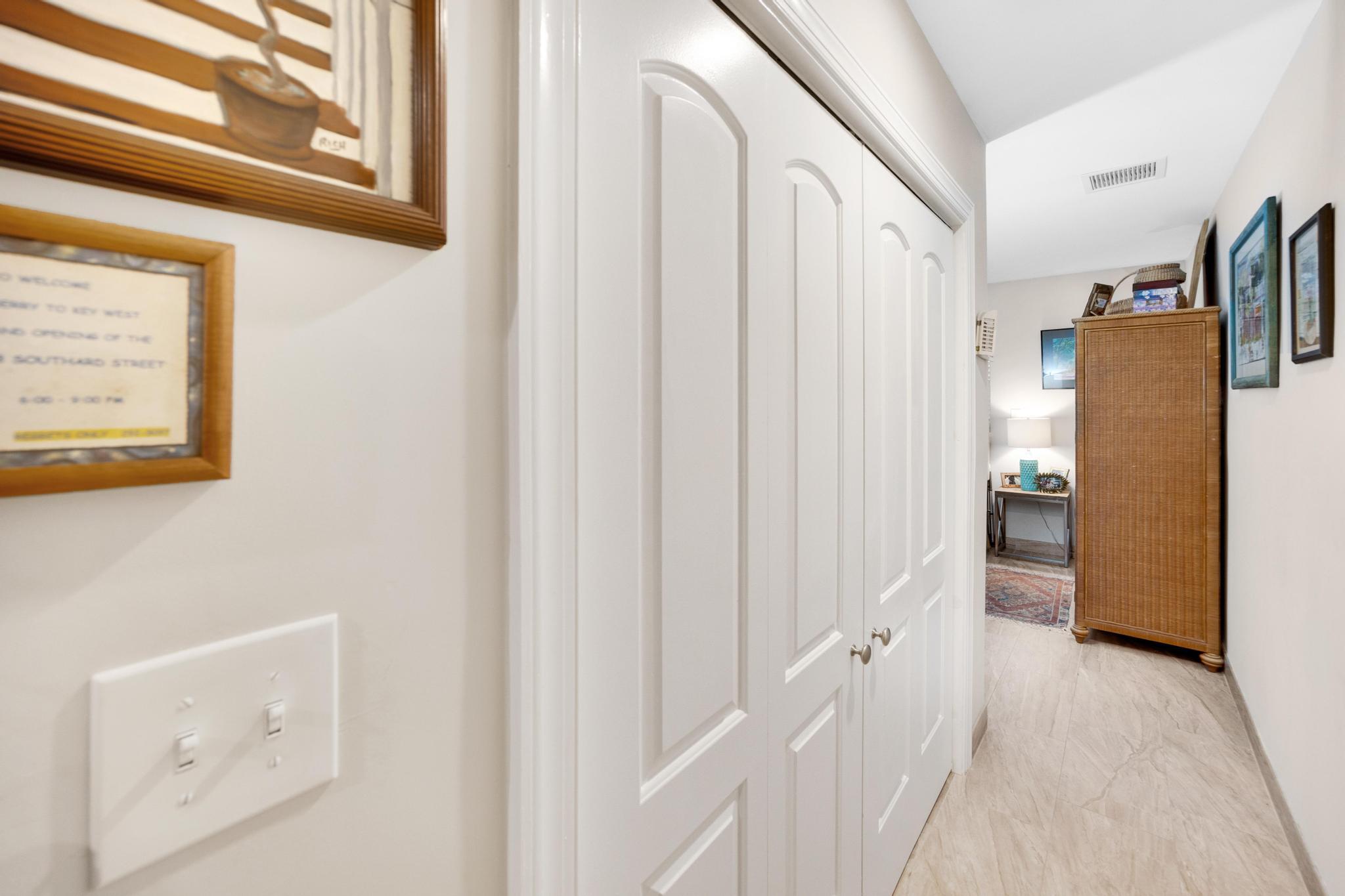 351 8th Street Key Colony Beach, FL 33051 - Photo 16 of 38 a view of a hallway with closet area