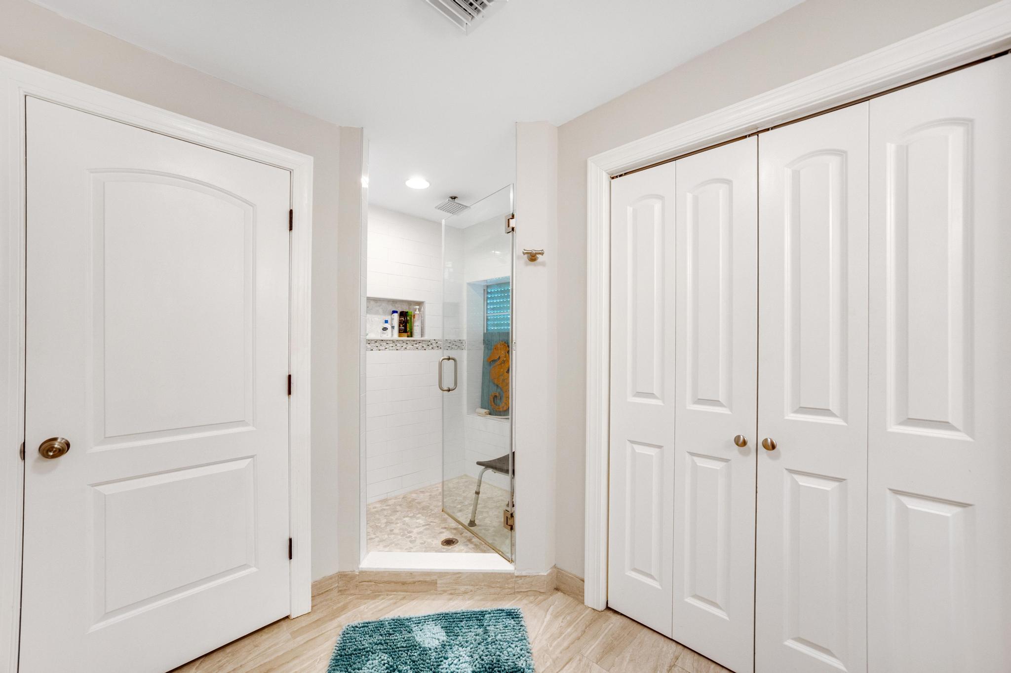 351 8th Street Key Colony Beach, FL 33051 - Photo 27 of 38 a view of a bathroom with a shower and a sink