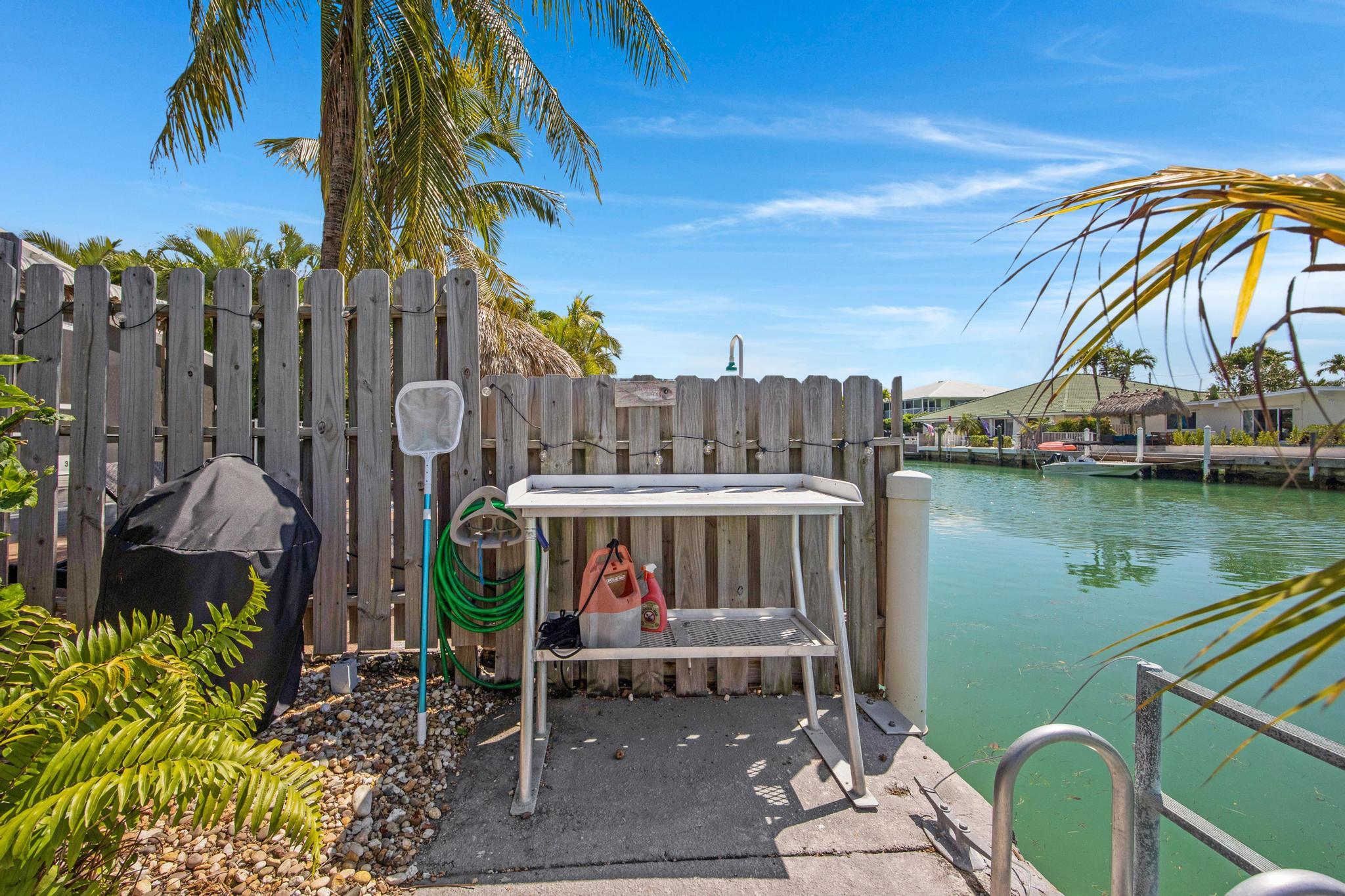 351 8th Street Key Colony Beach, FL 33051 - Photo 35 of 38 a view of a chairs and table in patio