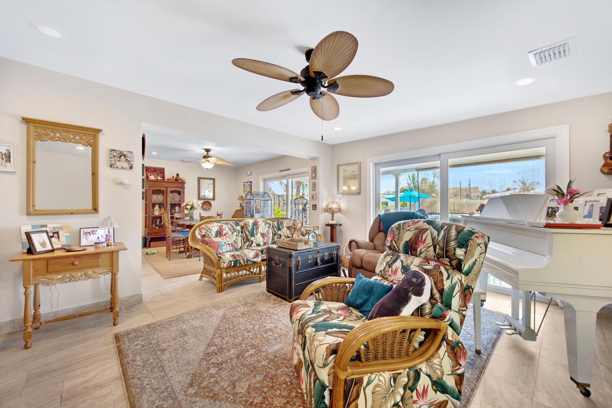 351 8th Street Key Colony Beach, FL 33051 - Photo 5 of 38 a living room with furniture kitchen view and a large window