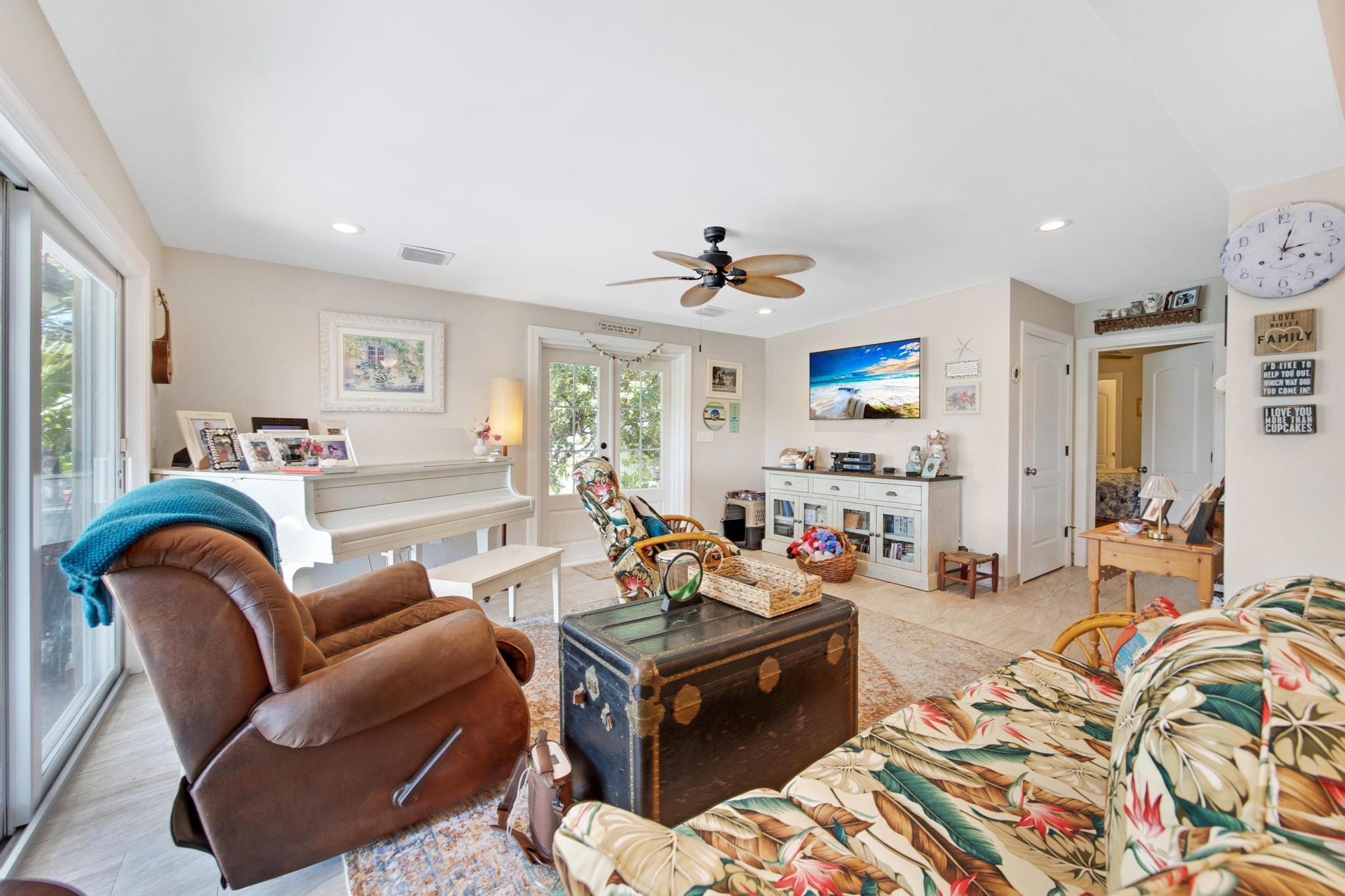 351 8th Street Key Colony Beach, FL 33051 - Photo 7 of 38 a living room with furniture and a large window