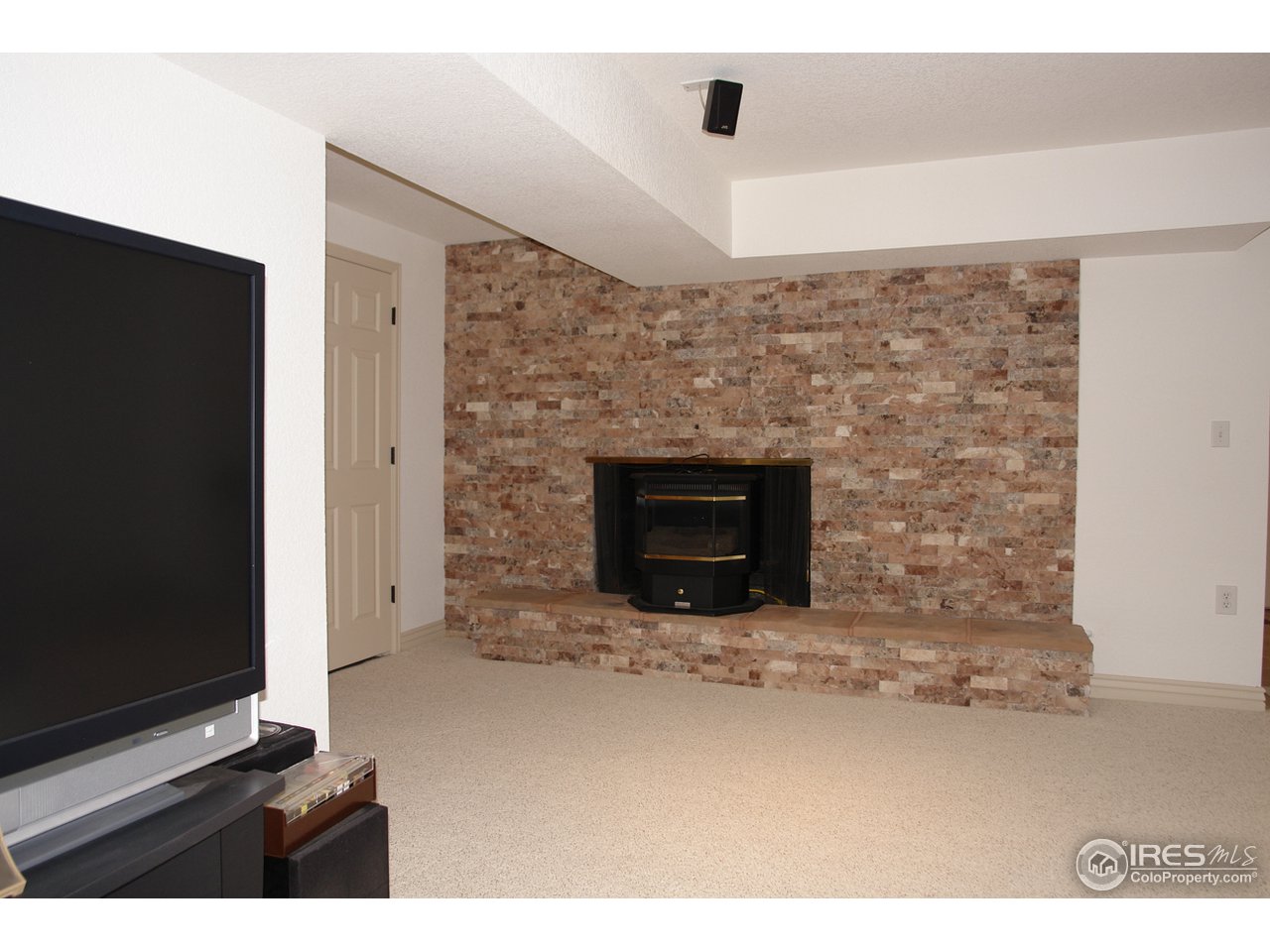 2206 West Prospect Road Fort Collins, CO 80526 - Photo 8 of 18 Basement Fireplace