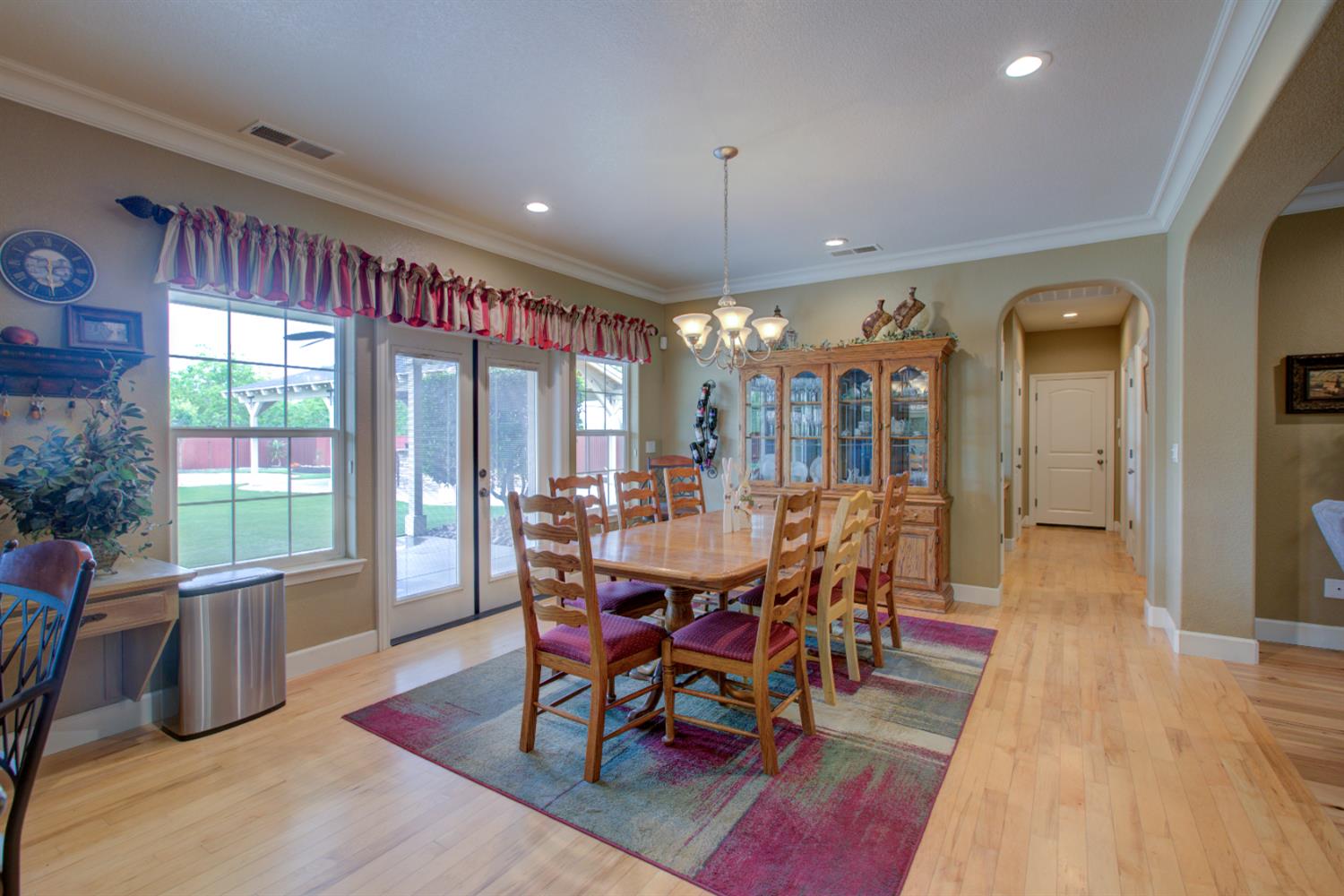 1054 Townhill Road Oakdale, CA 95361 - Photo 13 of 60 a view of a dining room with furniture window and wooden floor