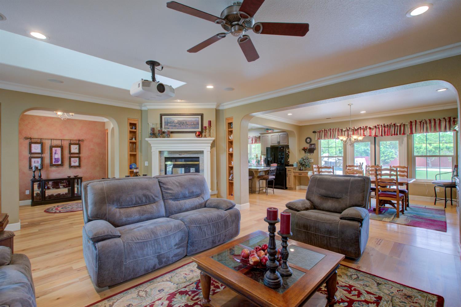1054 Townhill Road Oakdale, CA 95361 - Photo 14 of 60 a living room with furniture and a fireplace