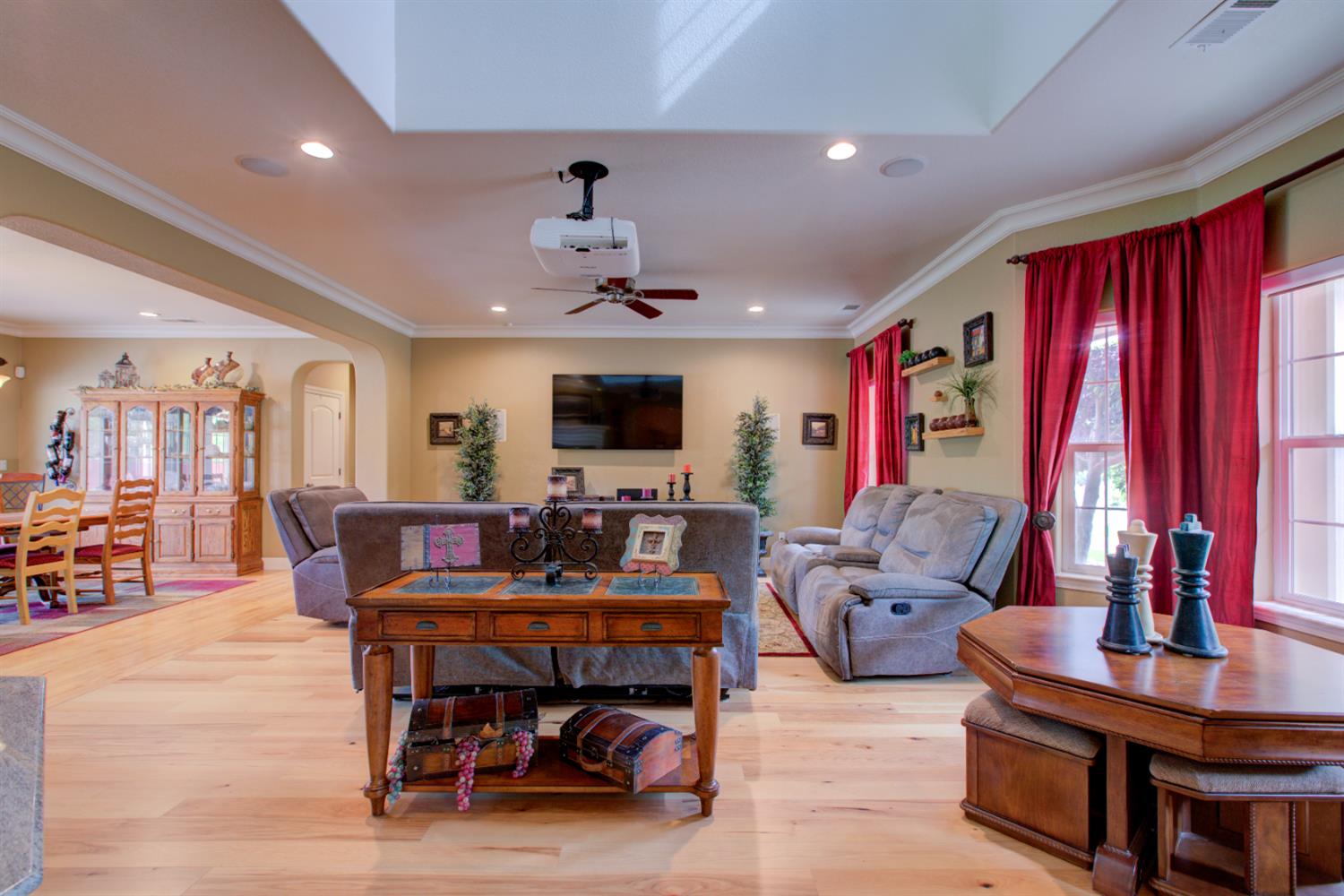1054 Townhill Road Oakdale, CA 95361 - Photo 16 of 60 a living room with furniture and a flat screen tv