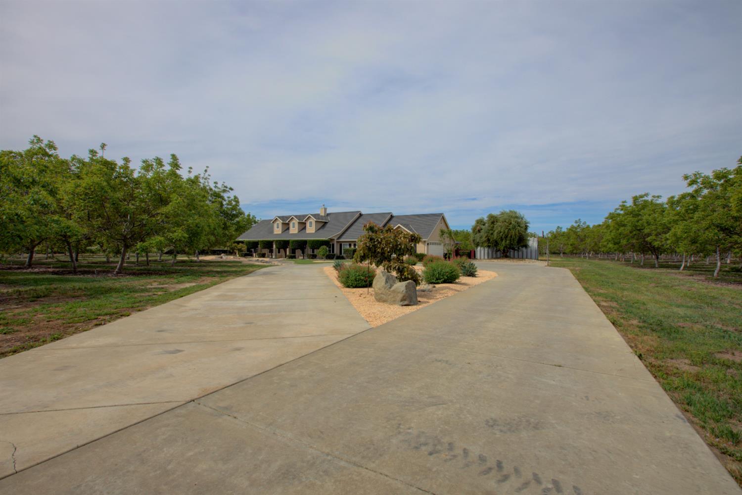 1054 Townhill Road Oakdale, CA 95361 - Photo 2 of 60 a view of a lake with outdoor space