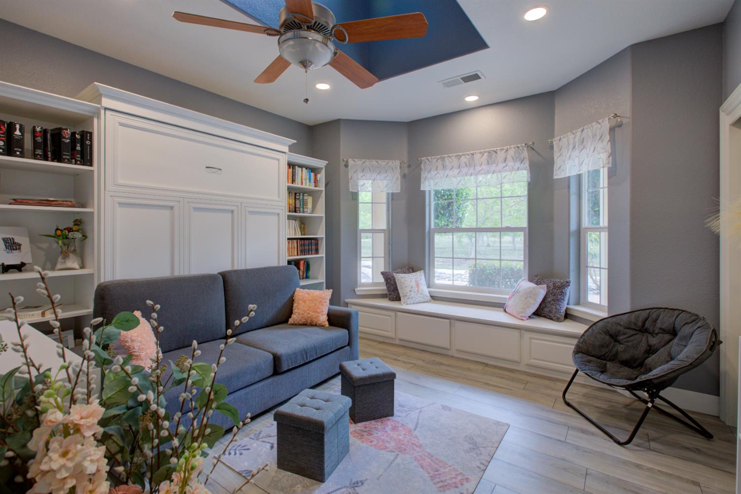 1054 Townhill Road Oakdale, CA 95361 - Photo 24 of 60 a living room with furniture and a large window