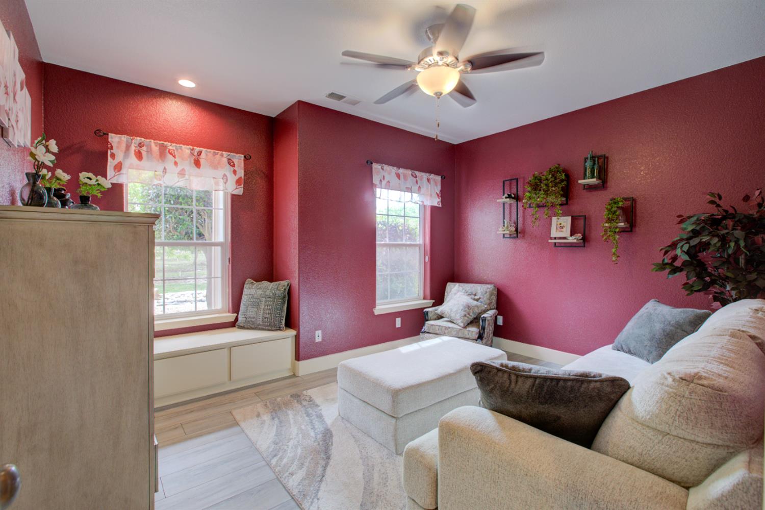 1054 Townhill Road Oakdale, CA 95361 - Photo 26 of 60 a living room with furniture chandelier and a window