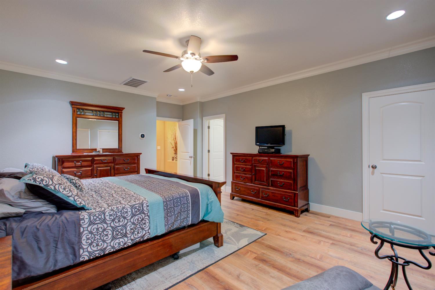 1054 Townhill Road Oakdale, CA 95361 - Photo 30 of 60 a bedroom with a bed and furniture