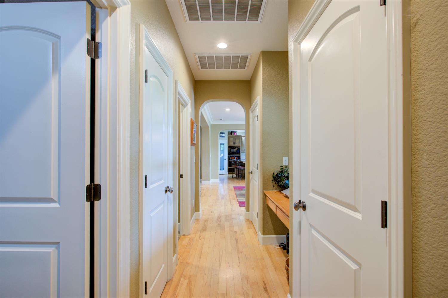 1054 Townhill Road Oakdale, CA 95361 - Photo 37 of 60 a view of a hallway with wooden floor and staircase